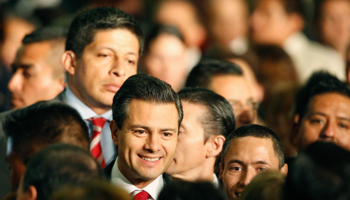 President-elect Pena Nieto greets the crowd as he arrives for an event in Mexico City (REUTERS/STRINGER Mexico)