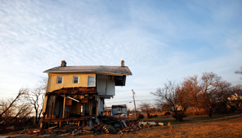 A house damaged by superstorm Sandy in New Jersey (REUTERS/Eduardo Munoz)