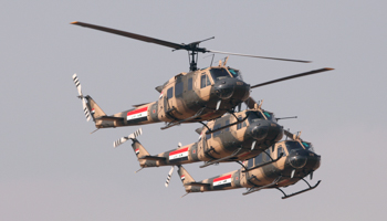 Iraqi Air Force helicopters participate in a ceremony marking the Iraqi Army's 91st anniversary in Baghdad (REUTERS/Saad Shalash)