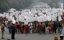 Women hold placards as they march during a rally protesting for justice and security for women, in New Delhi (REUTERS/Adnan Abidi)