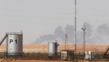 Smoke rises following demining operations at the In Amenas gas facility (REUTERS/Louafi Larbi)