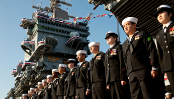 Sailors stand at attention during the inactivation ceremony of the USS Enterprise (REUTERS/Rich-Joseph Facun)