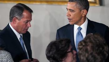 President Obama talks with Speaker of the House John Boehner (REUTERS/Benjamin Myers)