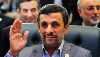 President Mahmoud Ahmadi-Nejad attends the Organisation of Islamic Cooperation summit in Cairo (REUTERS/Asmaa Waguih)