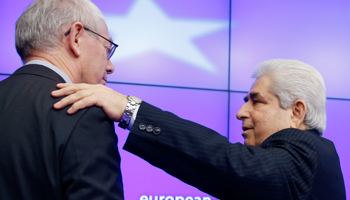 President Demetris Christofias greets European Council President Herman Van Rompuy (REUTERS/Francois Lenoir)