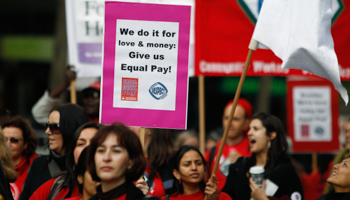 Women workers demand equal pay during a protest in Melbourne (REUTERS/Mick Tsikas)
