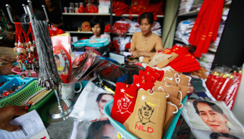 A party member sells memorabilia at the National League for Democracy's head office (REUTERS/Soe Zeya Tun)