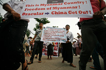 Protesters hold posters at a protest against the Latbadaung Mountain Copper Mine project (REUTERS/Soe Zeya Tun)