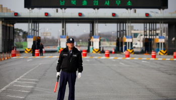 A South Korean security guard keeps watch at a customs gateway (REUTERS/Kim Hong-Ji)