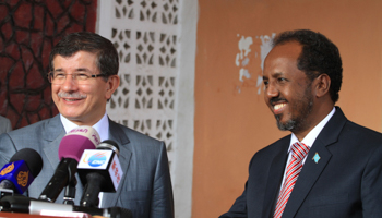 Somalia's President Hassan Sheikh Mohamud and Turkish Foreign Minister Ahmet Davutoglu (REUTERS/Omar Faruk)