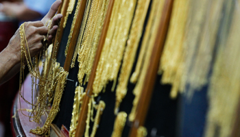 Gold chains for sale in Bangkok's Chinatown (Reuters/Chaiwat Subprasom)