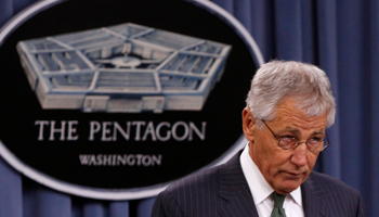 Chuck Hagel holds a news conference at the Pentagon (Reuters/Gary Cameron)