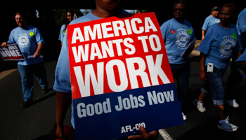 People march in the Labor Day Parade in Charlotte (Reuters/Eric Thayer)