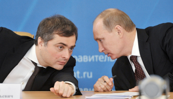 Vladislav Surkov talks with Vladimir Putin (Reuters/RIA Novosti)