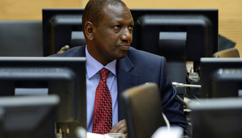 William Ruto sits in the courtroom of the International Criminal Court (Reuters/Lex van Lieshout/Pool)