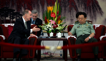 Tom Donilon speaks with General Fan Changlong in Beijing (Reuters/Alexander F. Yuan)