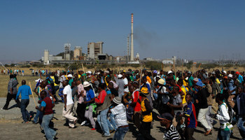 The mining community marches during a strike at Lonmin's Marikana mine on May 14 (Reuters/Siphiwe Sibeko)