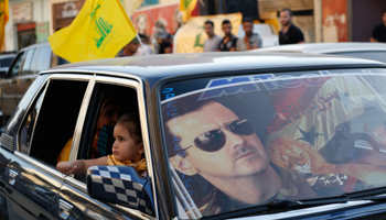 Hezbollah supporters in the Lebanese town of Hermel celebrate the capture of al-Qusayr (Reuters/Jamal Saidi)