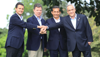 The presidents of Mexico, Colombia, Peru and Chile join hands at the Pacific Alliance summit in Cali (Reuters/Jaime Saldarriaga)