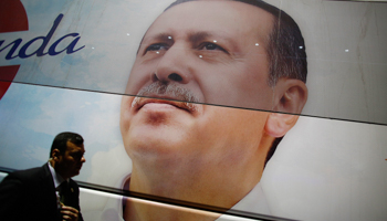 An image of Prime Minister Erdogan is seen at Istanbul's Ataturk airport (Reuters/Stoyan Nenov)