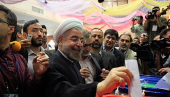 Hassan Rowhani casts his ballot in Tehran (Reuters/Yalda Moayeri)