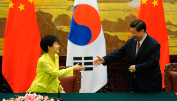 Park Geun-hye and Xi Jinping shake hands after a ceremony in Beijing (Reuters/Wang Zhao/Pool)