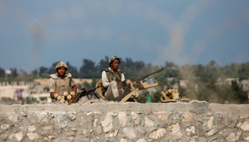 Egyptian soldiers keep guard on the border between Egypt and the Gaza Strip (Reuters/Ibraheem Abu Mustafa)