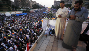 Members of the Muslim Brotherhood and supporters of Mohammed Morsi perform evening prayers (Reuters/Amr Abdallah Dalsh)