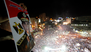 Anti-Mursi protesters chant slogans during a mass protest to support the army in Tahrir square (Reuters/Mohamed Abd El Ghany)