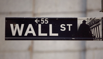 The Wall Street sign is seen near the New York Stock Exchange (Reuters/Chip East)