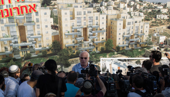 Israeli Housing Minister Uri Ariel speaks to reporters (Reuters/Ronen Zvulun)