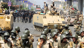 Riot police and army personnel take their positions during clashes with supporters of ousted President Morsi  (Reuters/Asmaa Waguih)