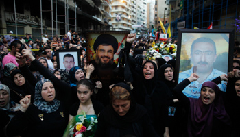 Lebanese supporters of Hezbollah take part in a candle light vigil in solidarity with people who died in a car bomb (Reuters/Sharif Karim)