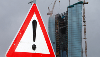 A traffic sign stands in front of the construction site for the new headquarters of the European Central Bank (Reuters/Ralph Orlowski)