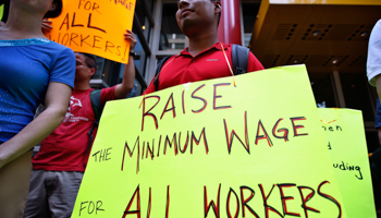 Low wage workers take part in a protest organized by the Coalition for a Real Minimum Wage (Reuters/Mike Segar)