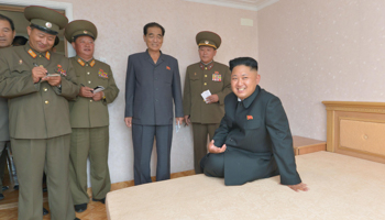 North Korean leader Kim Jong-un visits a housing facility  (Reuters/KCNA)