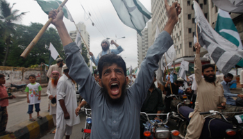 An Islamic supporter shouts slogans (Reuters/Athar Hussain)