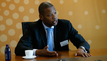 Carlyle Group sub-Saharan Africa Fund Co-Head Marlon Chigwende speaks at a Summit (Reuters/Mike Hutchings)