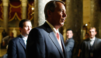 House Speaker John Boehner walks to the floor to vote for budget legislation (Reuters/Jonathan Ernst)