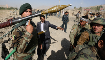 Afghan security forces arrive at the site of a suicide attack in Maidan Shar (Reuters/Omar Sobhani)