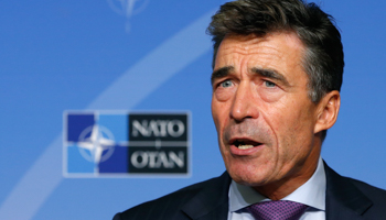 NATO Secretary General Anders Fogh Rasmussen talks to the media during a news conference (Reuters/Francois Lenoir)