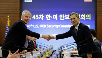 Secretary of Defense Chuck Hagel and South Korean Defense Minister Kim Kwan-jin shake hands in Seoul (Reuters/Lee Jin-man/Pool)