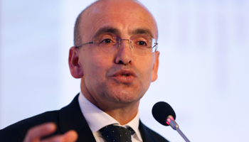 Mehmet Simsek speaks during the 4th Istanbul Finance Summit in Istanbul (Reuters/Murad Sezer)