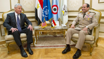 Defense Secretary Chuck Hagel sits next to General Abdel Fattah Sisi during a meeting in Cairo (Reuters/Jim Watson/Pool)