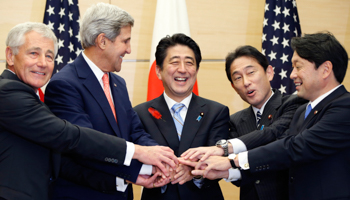 American and Japanese officials pose for photos during their meeting at the prime minister's residence in Tokyo (Reuters/Koji Sasahara/Pool)