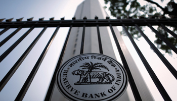 The Reserve Bank of India seal is pictured on a gate outside the RBI headquarters (Reuters/Danish Siddiqui)