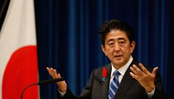 Prime Minister Shinzo Abe attends a news conference (Reuters/Toru Hanai)