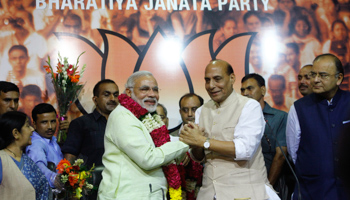 India's Hindu nationalist Narendra Modi is congratulated by Rajnath Singh, president of India's main opposition Bharatiya Janata Party, after Modi was crowned as the prime ministerial candidate for the BJP (Reuters/Anindito Mukherjee)