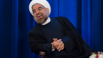 President Hassan Rouhani laughs as he speaks in New York (Reuters/Keith Bedford)