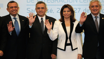 Central American leaders pose for an official photo at the Central American Integration System (SICA) summit in San Jose (Reuters/Juan Carlos Ulate)